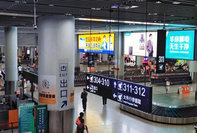 西安咸陽(yáng)機(jī)場(chǎng)到達(dá)行李廳高空燈箱廣告投放，西安機(jī)場(chǎng)廣告價(jià)格